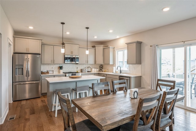 2920 Oak St, Norwalk, IA 50211 - dining room featuring dark wood finished floors and recessed lighting