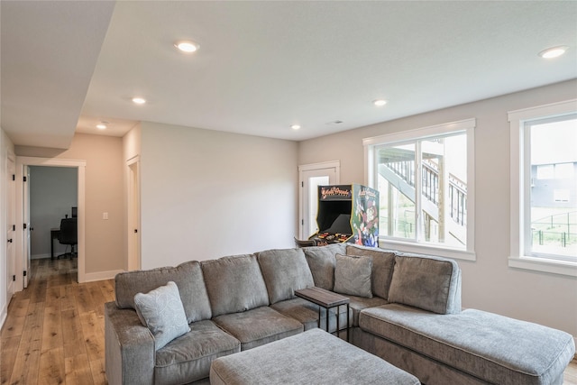 2920 Oak St, Norwalk, IA 50211 - living area featuring light wood-style flooring, recessed lighting, and baseboards