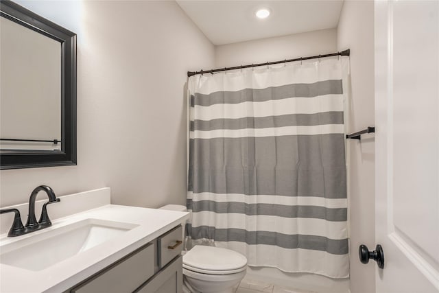 2920 Oak St, Norwalk, IA 50211 - bathroom with toilet, vanity, and a shower with curtain