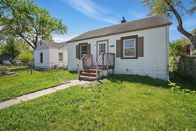 2057 Maple St, Des Moines, IA 50317 - bungalow with a chimney and roof with shingles
