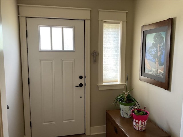 doorway with baseboards