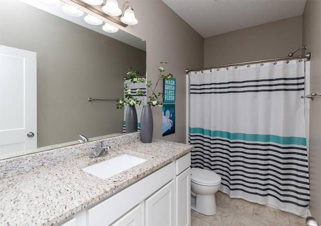 full bath with vanity, toilet, and curtained shower