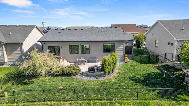 rear view of property with a patio, a storage shed, roof with shingles, an outbuilding, and outdoor lounge area