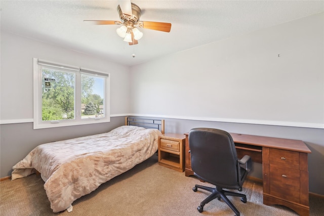 4727 80th Pl, Urbandale, IA 50322 - carpeted bedroom with an office area and a ceiling fan