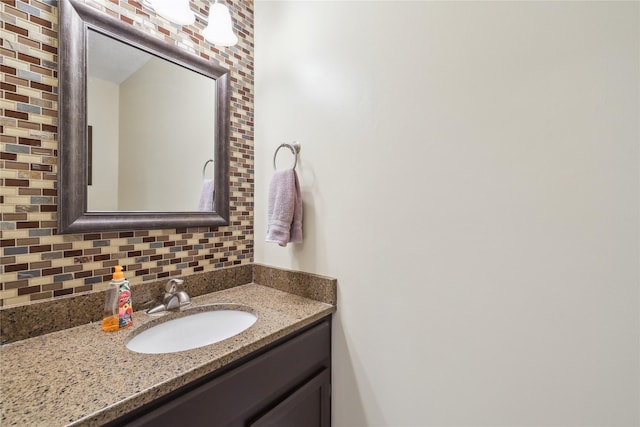 4727 80th Pl, Urbandale, IA 50322 - bathroom with vanity and decorative backsplash