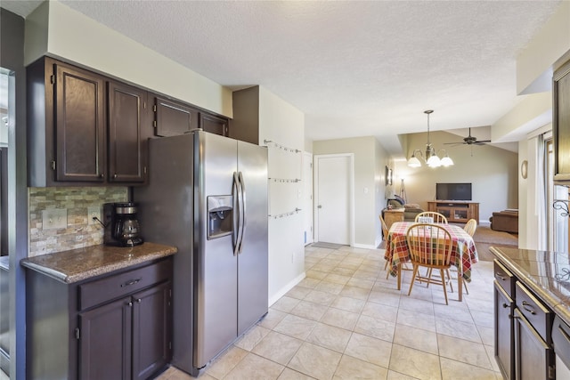 4727 80th Pl, Urbandale, IA 50322 - kitchen featuring stainless steel refrigerator with ice dispenser, tasteful backsplash, dark brown cabinets, decorative light fixtures, and a chandelier