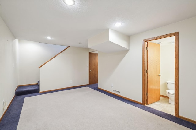 4727 80th Pl, Urbandale, IA 50322 - finished below grade area featuring carpet, recessed lighting, and stairway