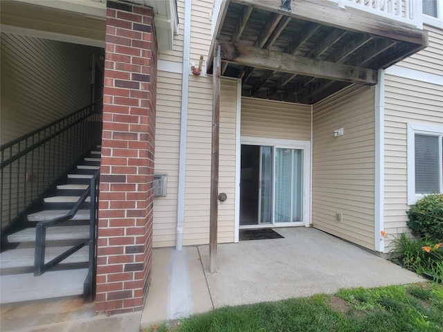 1210 NE 6th Ln Unit I9, Ankeny, IA 50021 - entrance to property with a patio area and brick siding