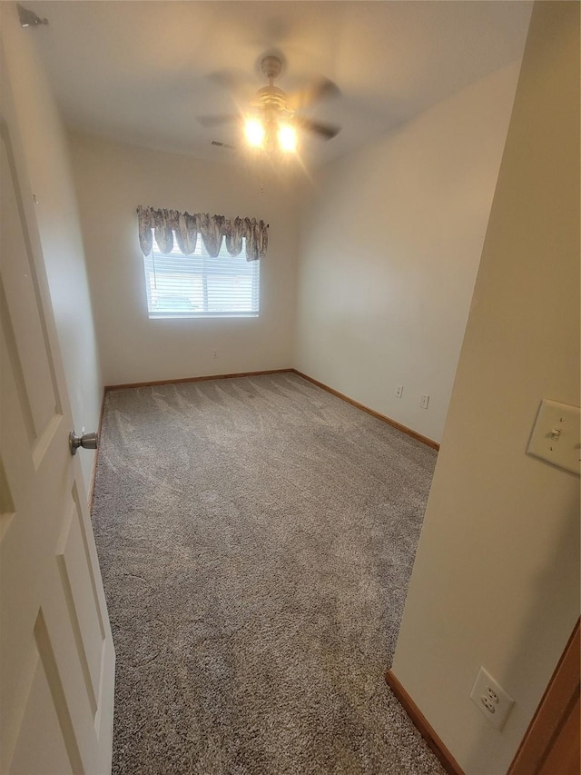 1210 NE 6th Ln Unit I9, Ankeny, IA 50021 - carpeted spare room with a ceiling fan and baseboards