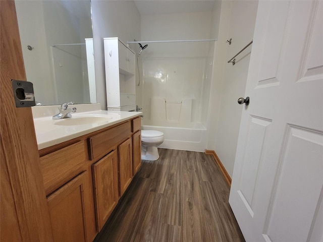 1210 NE 6th Ln Unit I9, Ankeny, IA 50021 - bathroom featuring vanity, wood finished floors, and  shower combination
