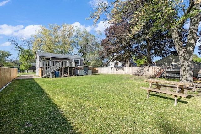518 Maxwelton Dr, Des Moines, IA 50315 - view of yard featuring stairs and a wooden deck