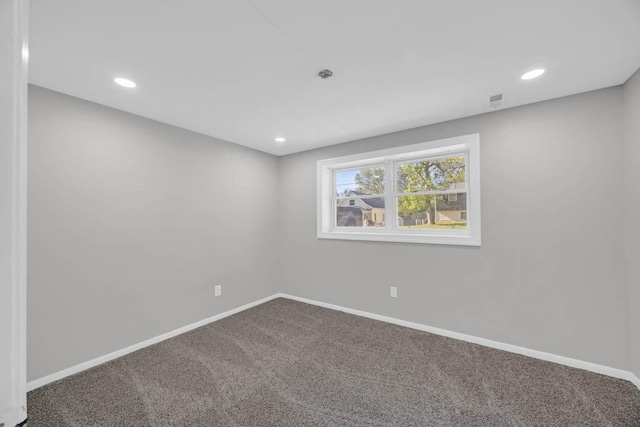 518 Maxwelton Dr, Des Moines, IA 50315 - spare room featuring carpet flooring, baseboards, and recessed lighting