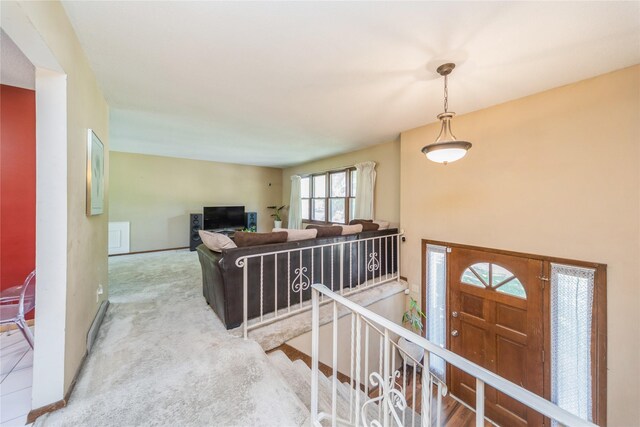 4021 80th St, Urbandale, IA 50322 - foyer with carpet and baseboards