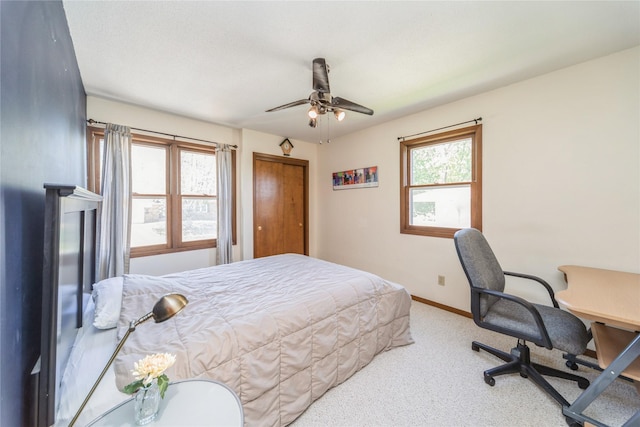 4021 80th St, Urbandale, IA 50322 - bedroom featuring carpet, baseboards, and ceiling fan