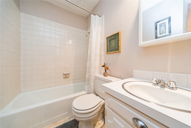 4021 80th St, Urbandale, IA 50322 - full bath featuring toilet, shower / bath combo with shower curtain, and vanity