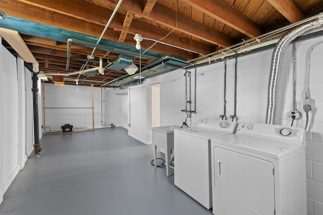 2400 39th St, Des Moines, IA 50310 - unfinished below grade area with washer and clothes dryer