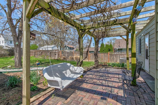 2400 39th St, Des Moines, IA 50310 - view of patio featuring a pergola and a residential view