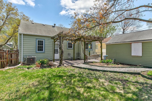 2400 39th St, Des Moines, IA 50310 - rear view of property featuring a pergola, central AC, a patio, and a shingled roof