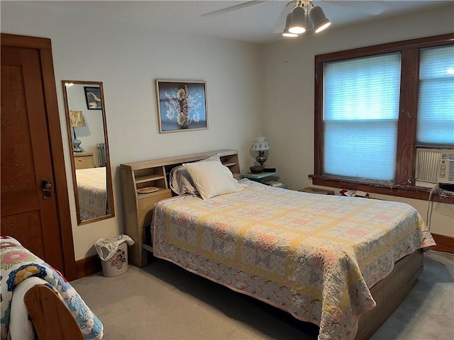 bedroom featuring carpet floors and a ceiling fan