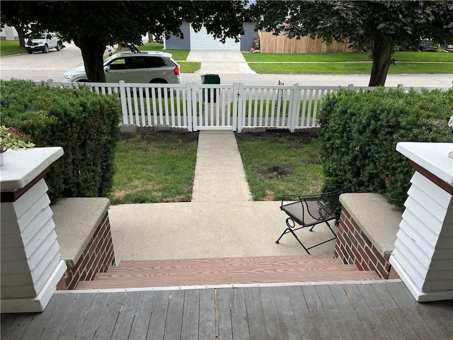 deck featuring a fenced front yard