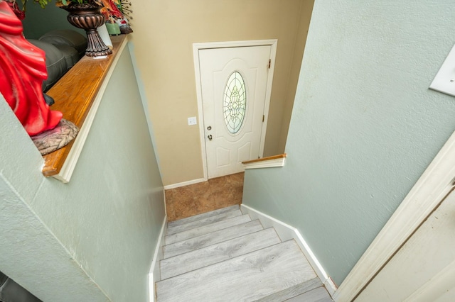 102 Wall Ave, Des Moines, IA 50315 - stairs featuring baseboards