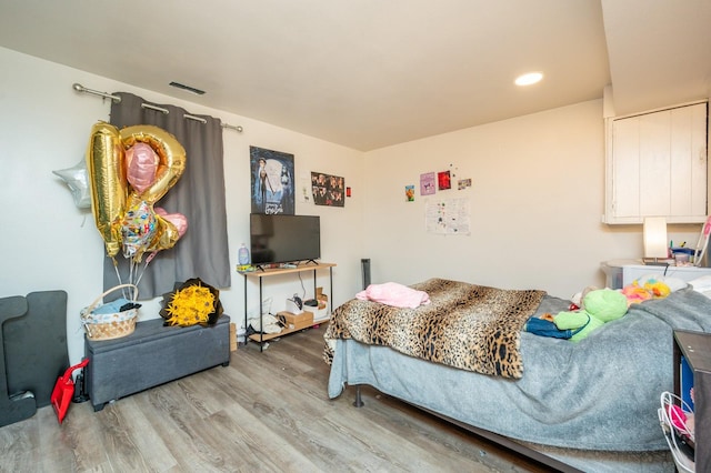 102 Wall Ave, Des Moines, IA 50315 - bedroom with wood finished floors