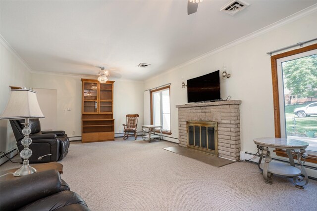 living area with a ceiling fan, carpet, ornamental molding, a brick fireplace, and a baseboard radiator