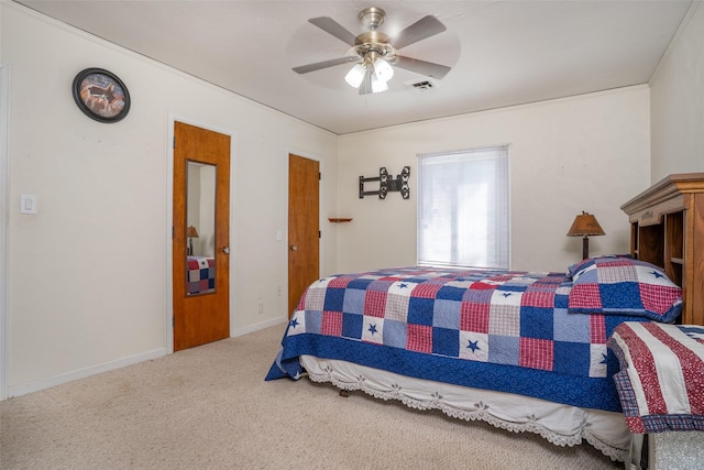 bedroom featuring carpet, ceiling fan, and baseboards