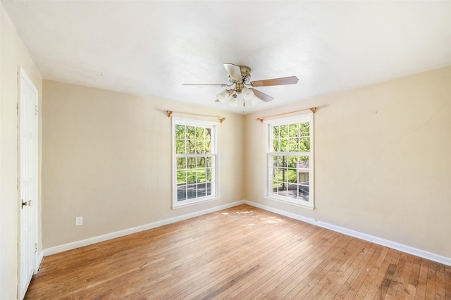 3936 Hubbell Ave, Des Moines, IA 50317 - empty room featuring light wood-style flooring, baseboards, and a ceiling fan