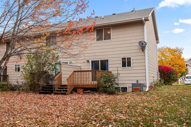 1634 Prairie Cir, Altoona, IA 50009 - back of house with a deck and central air condition unit