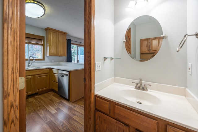 1634 Prairie Cir, Altoona, IA 50009 - bathroom with wood finished floors and vanity