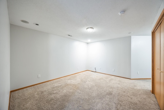 1634 Prairie Cir, Altoona, IA 50009 - spare room featuring carpet flooring, baseboards, and a smoke detector