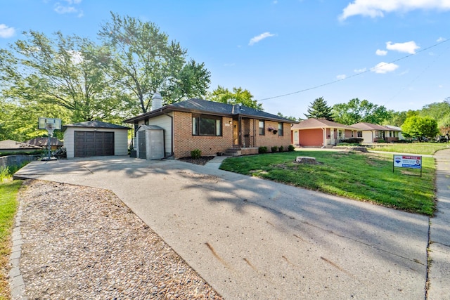 3101 Roblang Ct, Des Moines, IA 50317 - ranch-style home with driveway, brick siding, an outdoor structure, a front lawn, and a garage