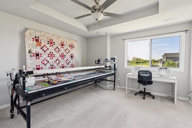 2642 SE Osier Ave, West Des Moines, IA 50265 - miscellaneous room featuring a raised ceiling, carpet floors, and a ceiling fan