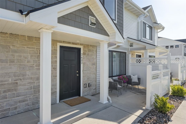 2642 SE Osier Ave, West Des Moines, IA 50265 - entrance to property featuring stone siding