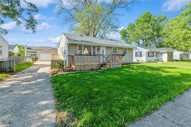 1916 Locust St, West Des Moines, IA 50265 - view of front of house featuring an outbuilding, a wooden deck, and a detached garage