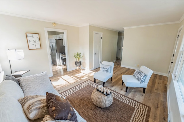 1916 Locust St, West Des Moines, IA 50265 - living room with light wood finished floors, ornamental molding, and baseboards