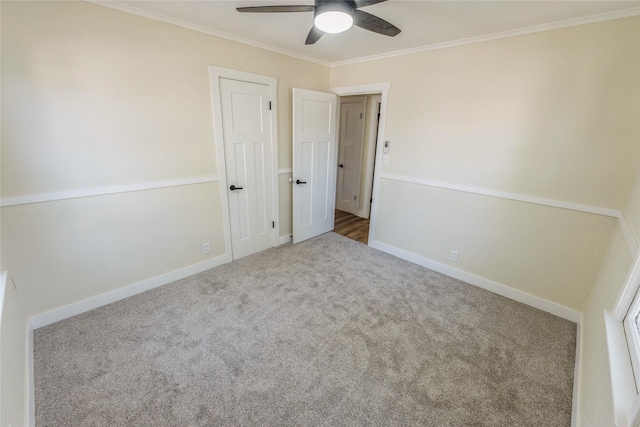 1916 Locust St, West Des Moines, IA 50265 - unfurnished bedroom with ornamental molding, carpet floors, baseboards, and ceiling fan