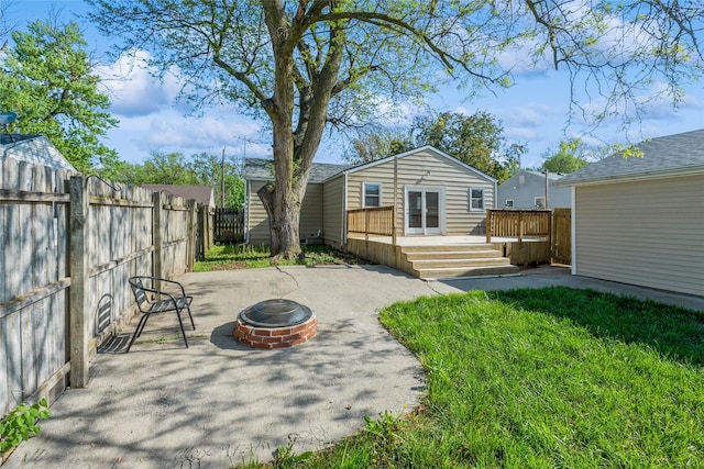 1916 Locust St, West Des Moines, IA 50265 - rear view of property with an outdoor fire pit, a deck, and a patio