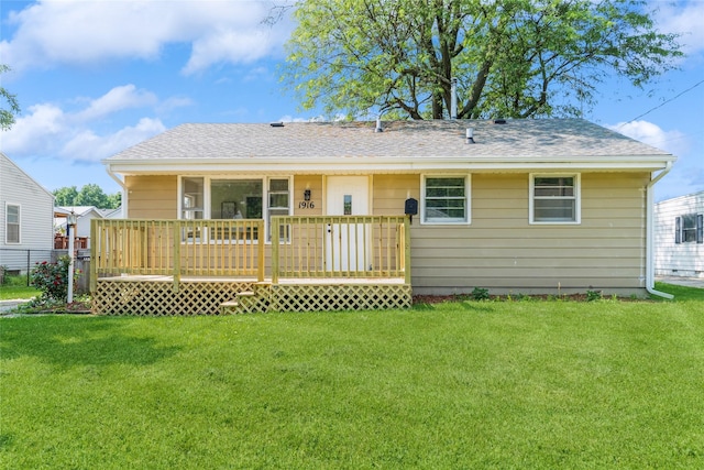 1916 Locust St, West Des Moines, IA 50265 - rear view of house featuring a yard, roof with shingles, and a wooden deck