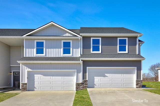 view of front of property with stone siding, a garage, roof with shingles, and concrete driveway