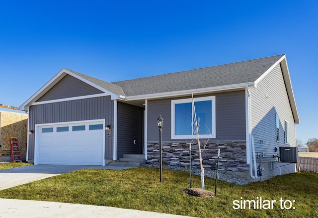 ranch-style house featuring a garage, a front yard, concrete driveway, and cooling unit
