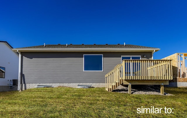 rear view of house with a deck, a yard, central AC unit, and crawl space