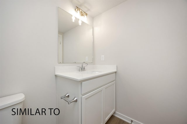 6565 NE 11th Ct, Des Moines, IA 50313 - half bath featuring toilet and vanity