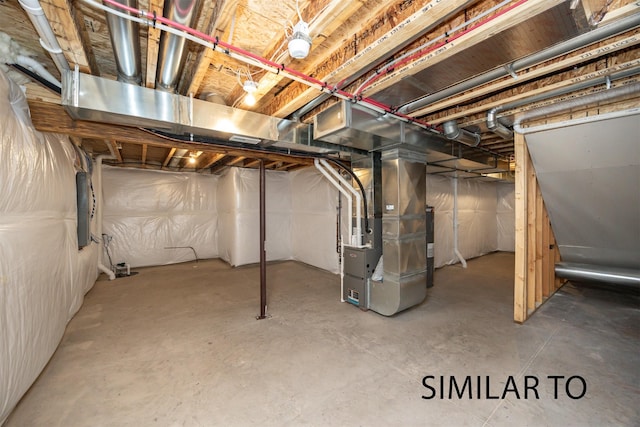 6557 NE 11th Ct, Des Moines, IA 50313 - unfinished below grade area with heating unit