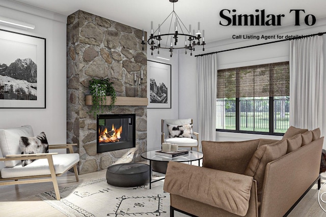 601 W Wright Rd, Norwalk, IA 50211 - living area featuring a chandelier, wood finished floors, and a fireplace