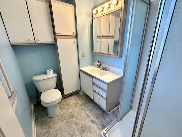 full bath featuring toilet, vanity, and a shower