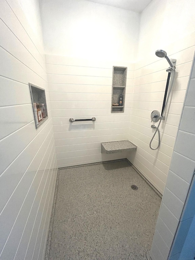 1913 N 1st St, Winterset, IA 50273 - bathroom with tiled shower and speckled floor