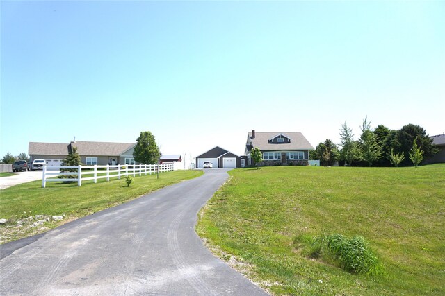 1913 N 1st St, Winterset, IA 50273 - view of front of property featuring a detached garage