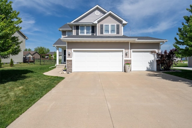 view of front facade featuring concrete driveway and an attached garage
